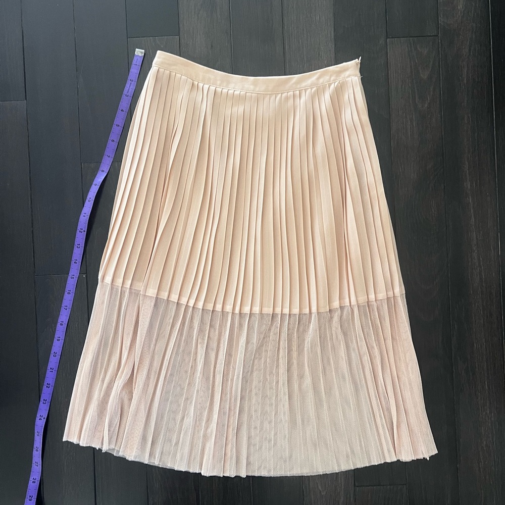 Chic Pleated Midi Skirt in Soft Pink with mesh layer
